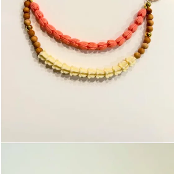 Handmade coral and cream charm